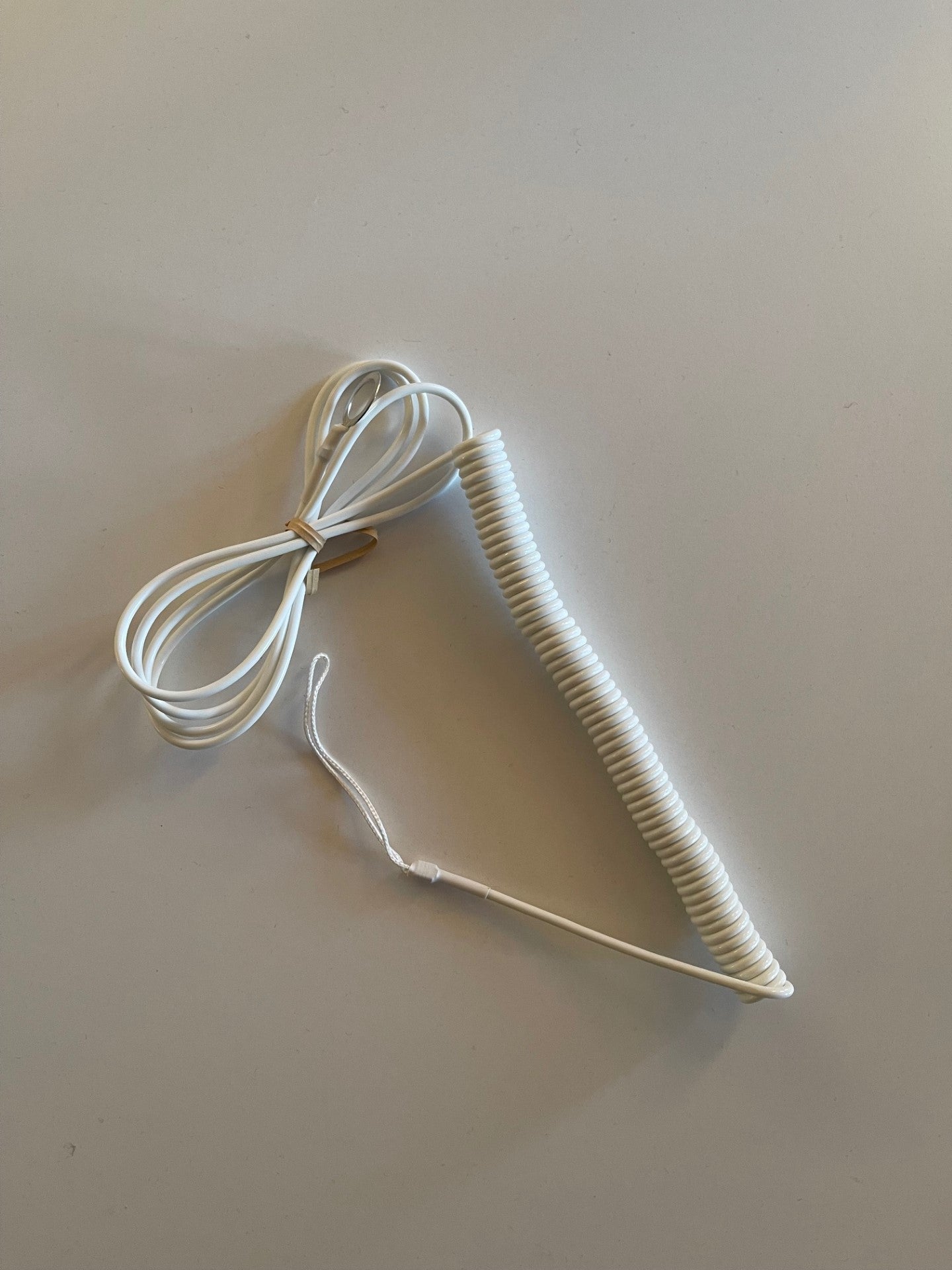 Cordon spirale pour télécommande